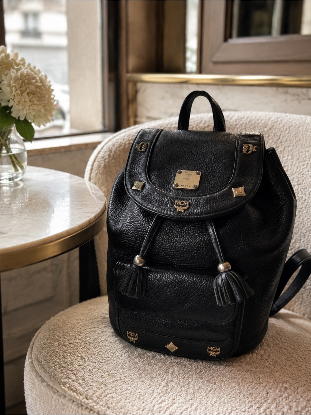Vintage MCM Black Pebbled Leather Drawstring Backpack Gold-Tone Studs